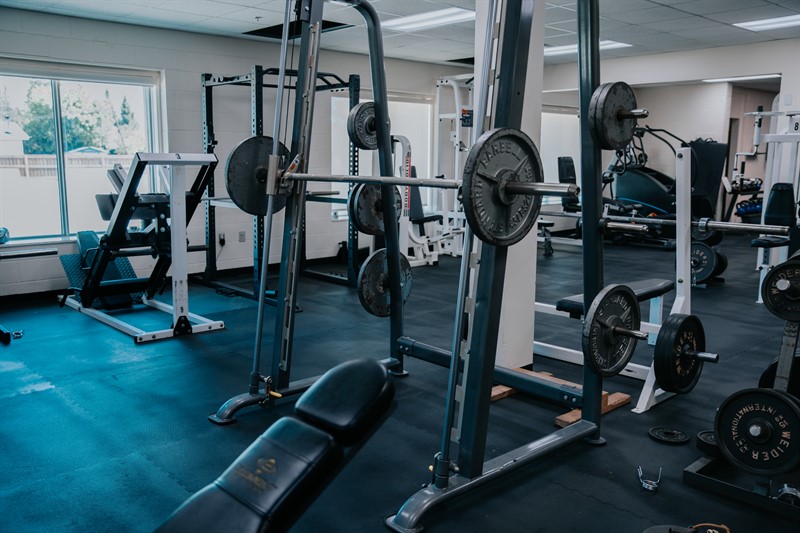 Fitness room barbells